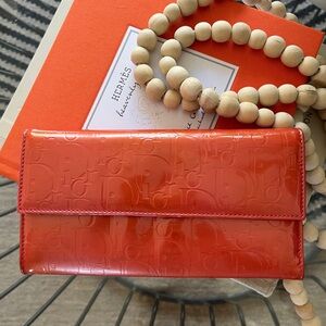 🌟SALE🌟CHRISTIAN DIOR PARIS Trotter wallet orange patent leather/pink interior.